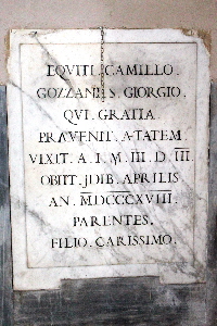 Piazza_di_S_Lorenzo_in_Lucina-Chiesa_omonima-Lapide_di_Camillo_Gozzani-1818
